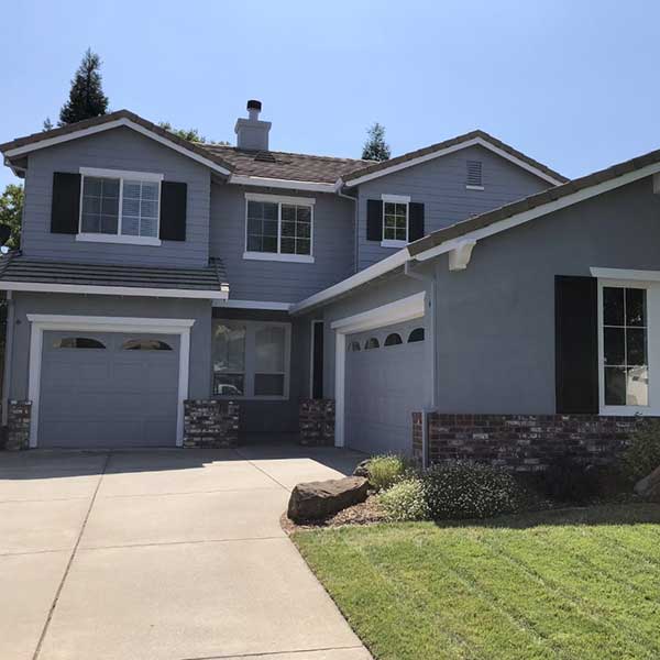 photo of two story home after being repainted