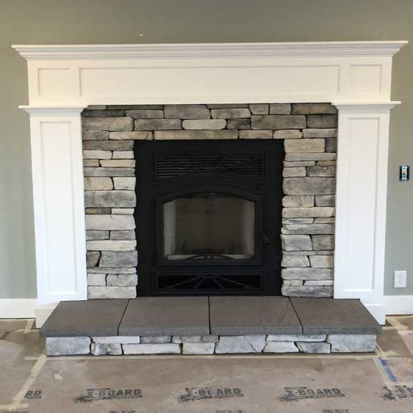 photo of fireplace hearth after being painted